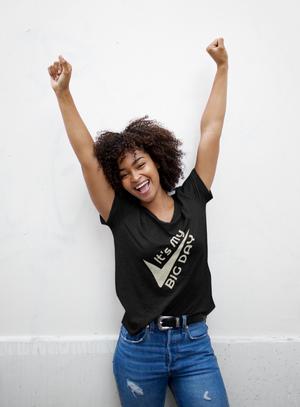BIG DAY Celebration Collection - Woman holding arms up in celebration while wearing It's My BIG DAY Black T-shirt