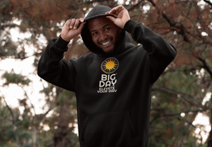 BIG DAY® Men's Tees & Apparel - smiling man wearing BIG DAY Elevate Your Day black hoodie