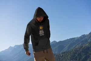 BIG DAY® Men's Hoodies - man standing among mountains wearing BIG DAY Elevate Your Day black hoodie